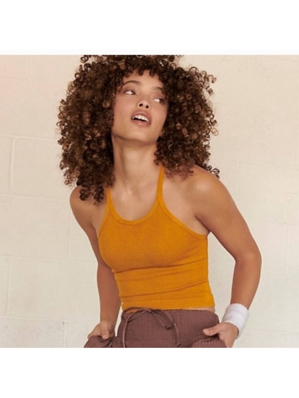 Free People happiness runs long crop tank in golden ochre